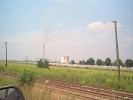 Na okruhu kolem Bukurešti. Hřbitov v pozadí s elektrárnou?  - 